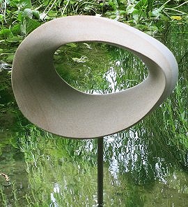 Geometric stone sculpture Möbius egg II