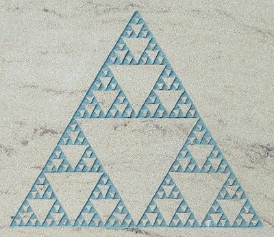 Sierpinskis gasket engraved sandstone